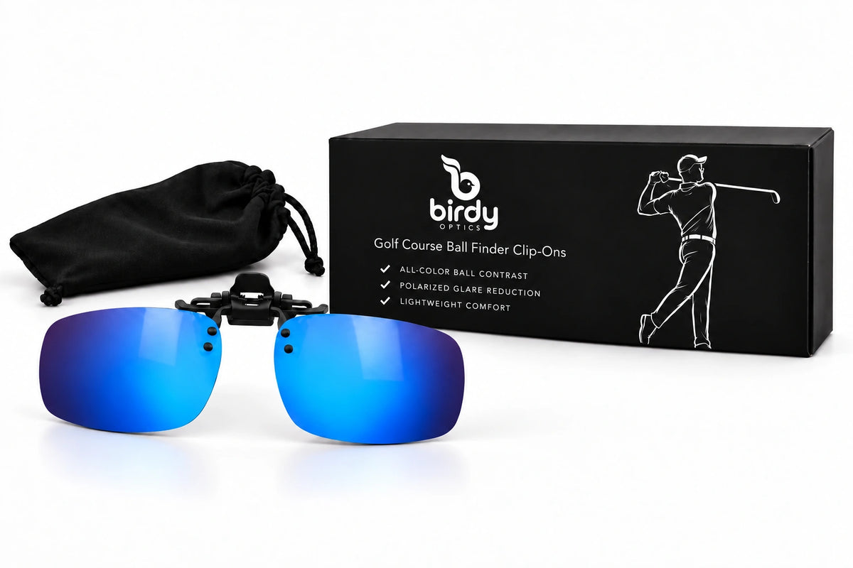 Birdy Dark Blue clip-on lenses, branded presentation box and small storage pouch on a white studio background